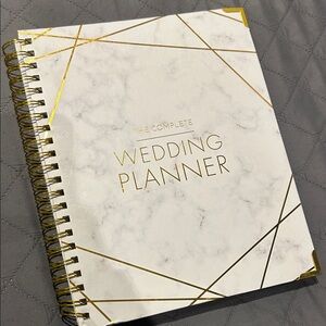 Elegant Gold and White Wedding Planner